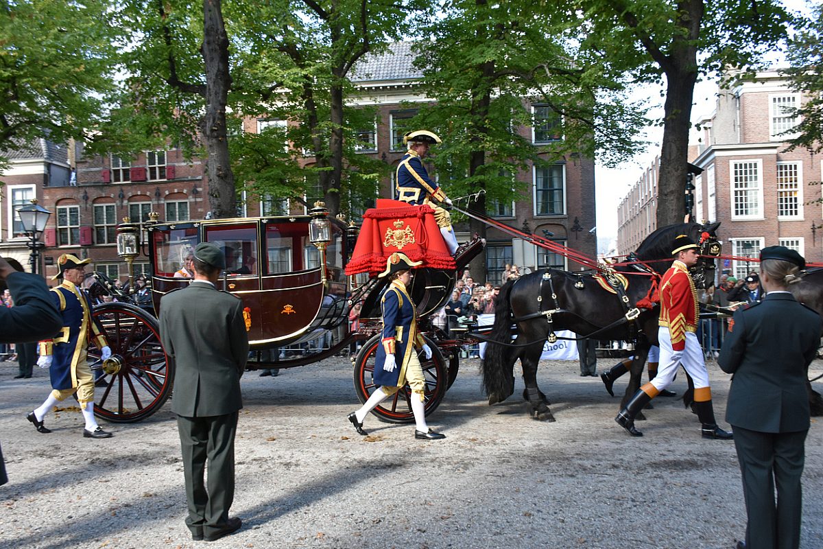 Dutch Armed Forces Standing With Gun, Looking, People Standing, Looking Around, Taking Picture And Greeting Prince Constantijn Of The Netherlands, Princess Laurentien Brinkhorst Of The Netherlands, Who Is Sitting Down Inside Glass Coach During Prinsjesdag, The Day On Which King Willem Alexander Of The Netherlands Addresses A Joint Session Of The Dutch Senate And House Of Representatives To Give The Speech From The Throne Setting Out The Main Features Of Government Policy For The Coming Parliamentary Session In The Hague The Netherlands Europe