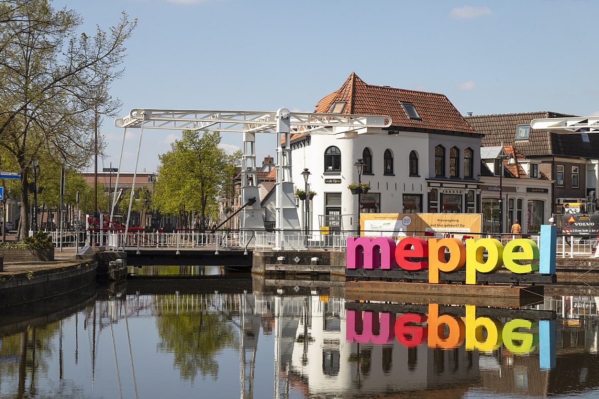 Meppel, Netherlands, May 2, 2022; Cityscape of Meppel with the name of the city in colored letters.