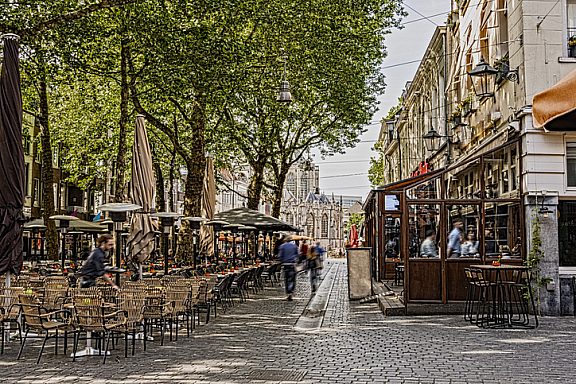 walk and restaurant terraces in the center of the city of breda in the background you can see the great church. Netherlands Netherlands