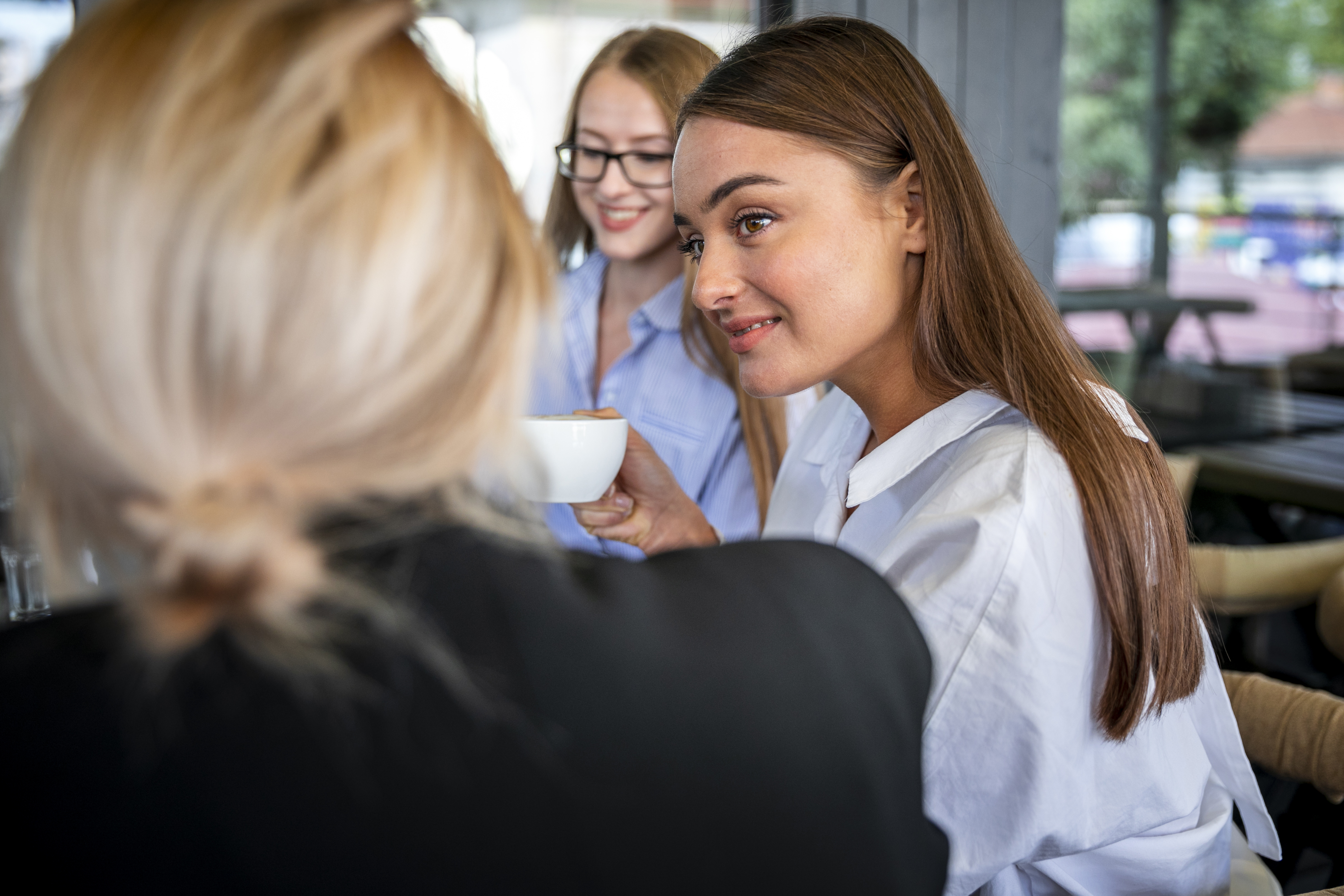 High angle women work meeting
